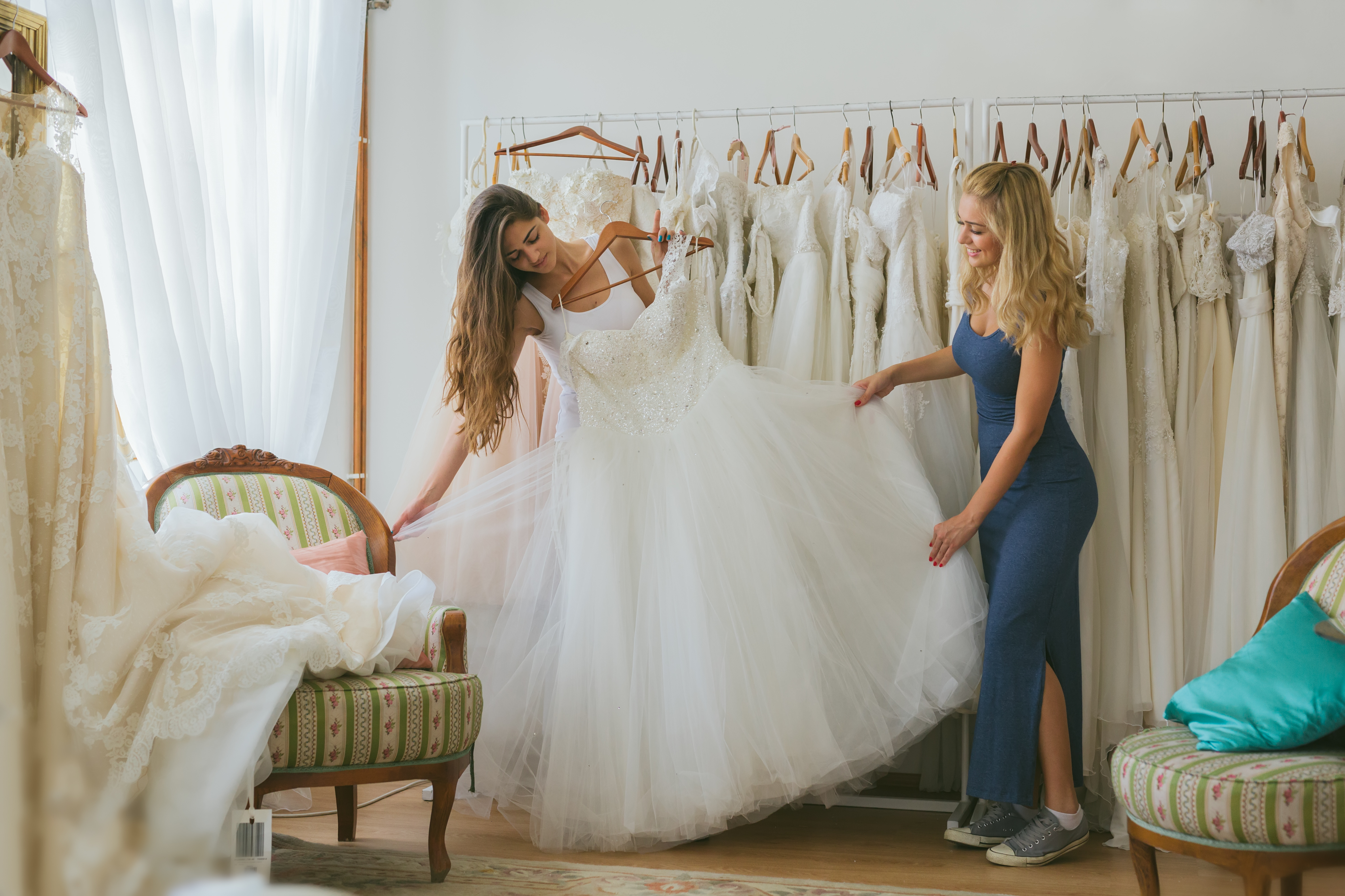 Bride Wedding Dress Shopping with her friend