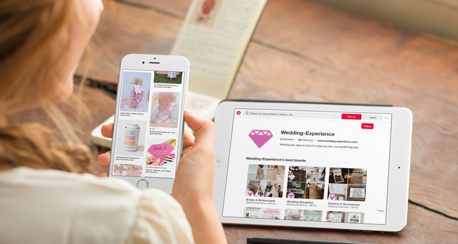 Woman using Pinterest app to plan wedding