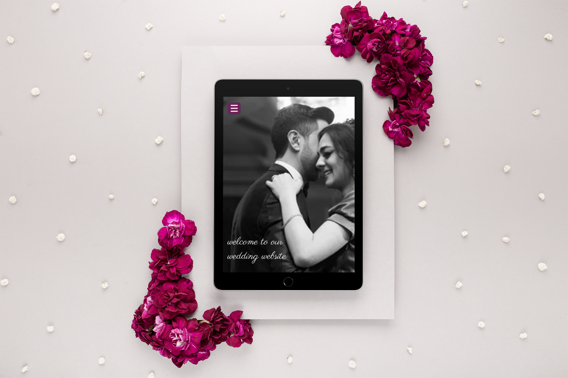 ipad displaying wedding website created by RSVPify's wedding website builder