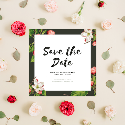 Example of a Canva Save the Date template surrounded by flowers