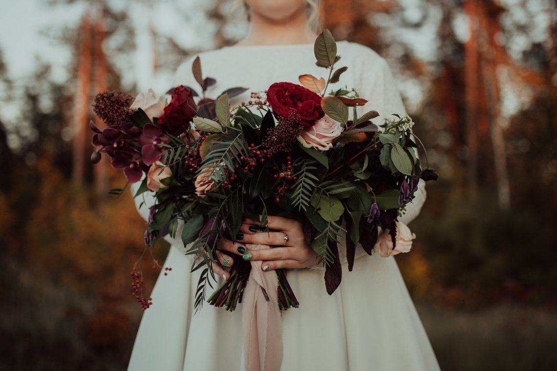 Bride holding beautiful wedding bouquet