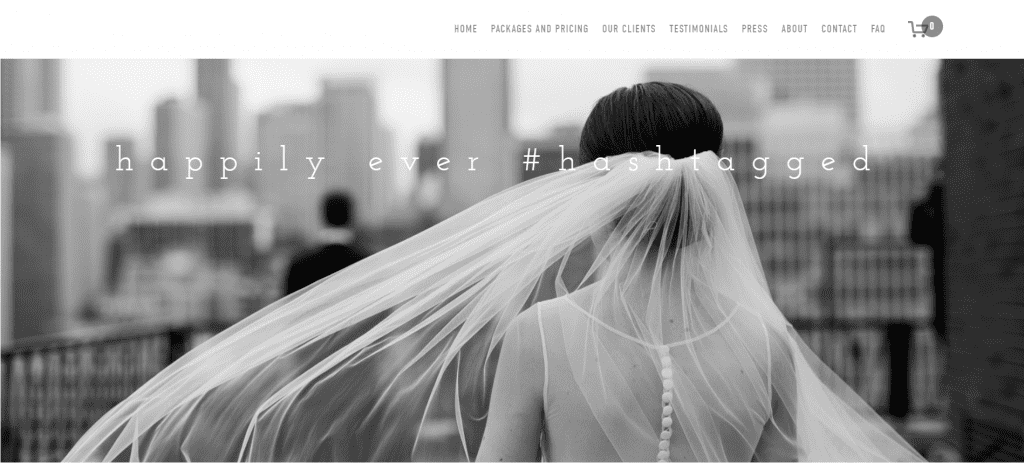 Happily ever hashtagged homepage. Black and white image of bride with text that reads "happily ever #hashtagged"