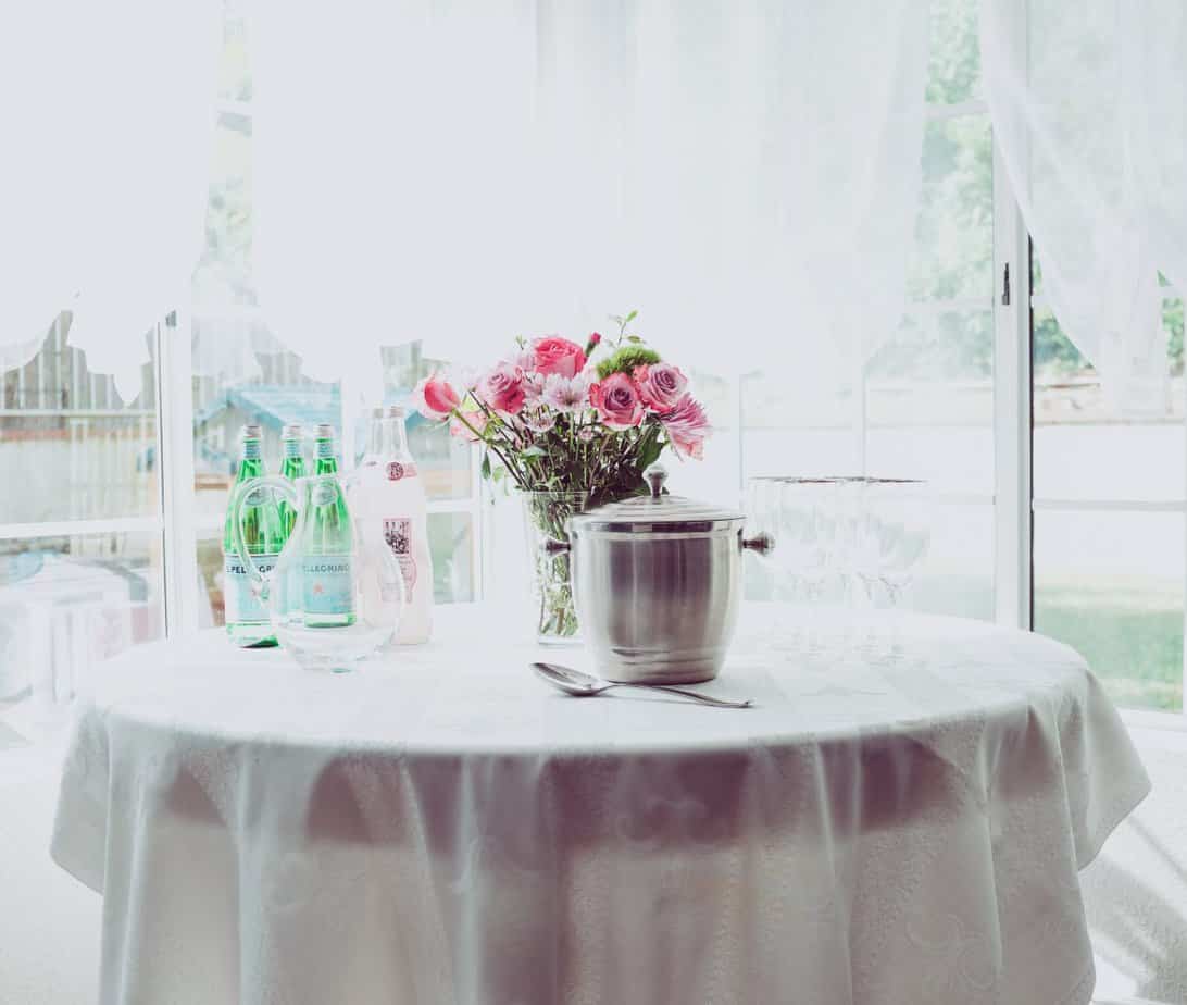 Garden Style Bridal Shower with Sparkling Water and Flowers on table