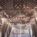 Rustic barn venue with string lighting